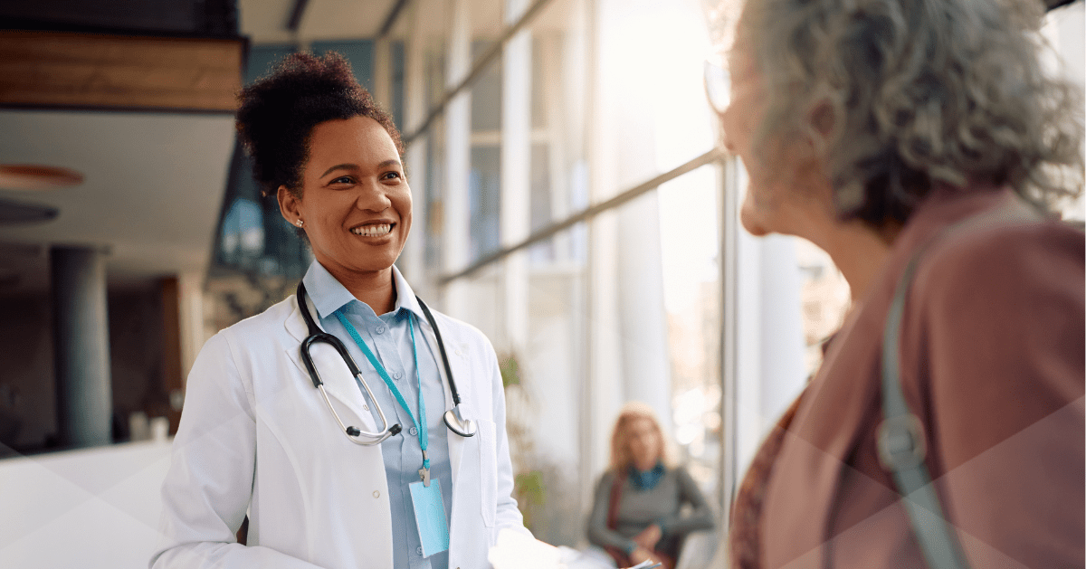 Female Physician in Lobby with Patient